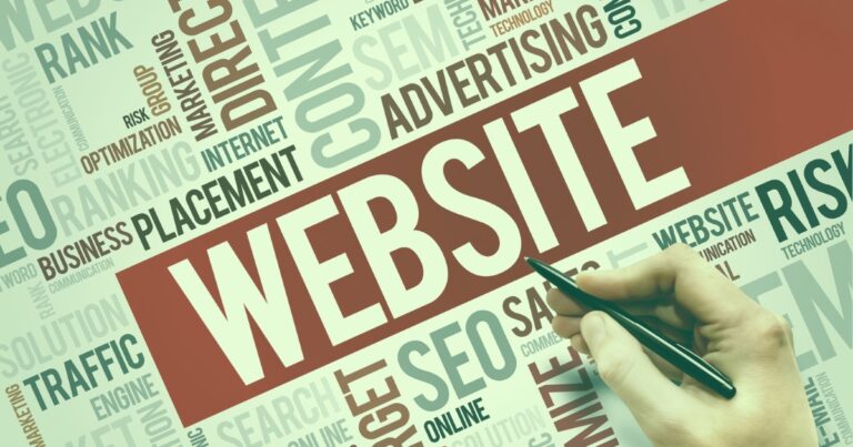 Hand writing on a background of keywords related to digital marketing, including "website," "SEO," "traffic," and "advertising," emphasising strategies for boosting online presence.